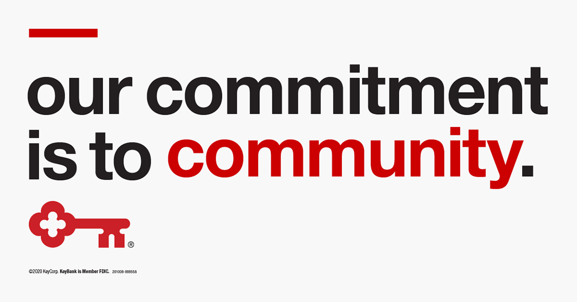 A banner with the phrase, 'Our Commitment is to Community.'